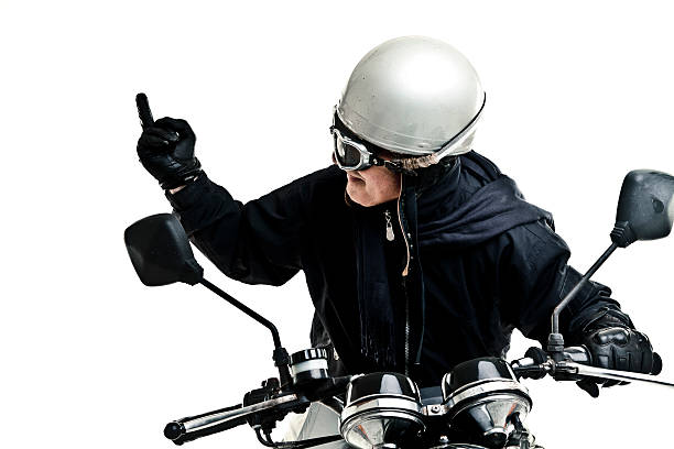 man drive his motorcycle with helmet and glasses