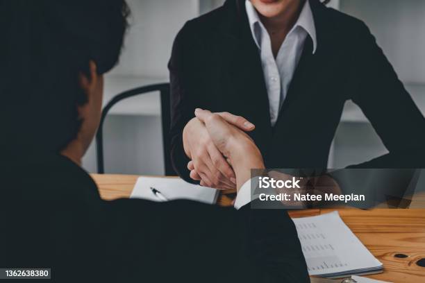 Close Up Business People Shaking Hands Finishing Up Meeting Success Dealing Greeting And Partner Concept Stock Photo - Download Image Now
