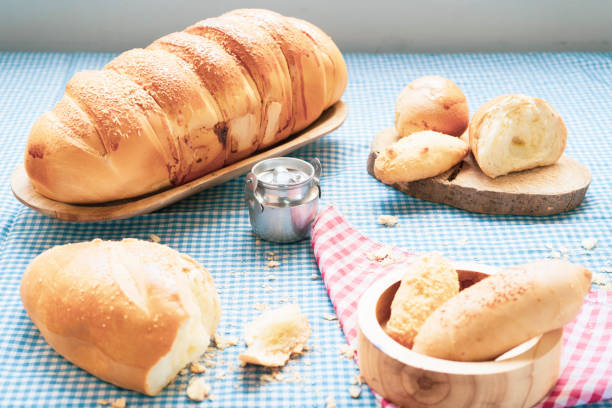 istock Baked breads on wooden table background. 1362643325
