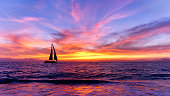 istock Colorful Sunset Sailboat Ocean Inspirational Landscape 1362645810