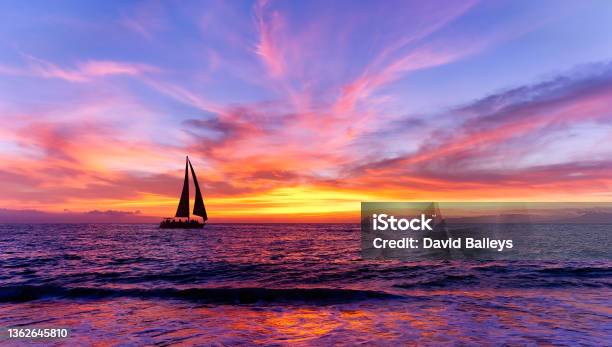 Colorful Sunset Sailboat Ocean Inspirational Landscape Stock Photo - Download Image Now