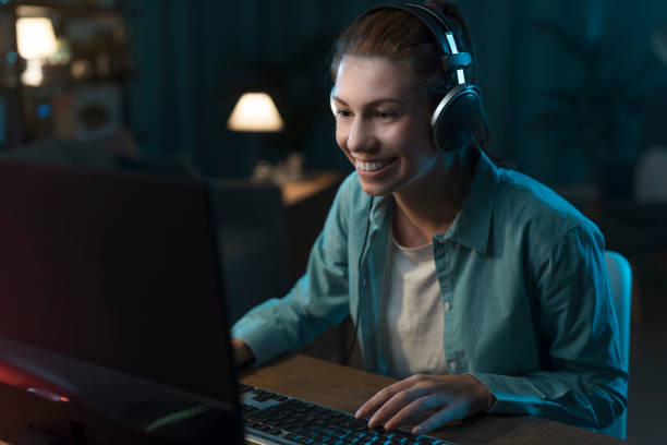 istock Girl playing online video games 1362658965