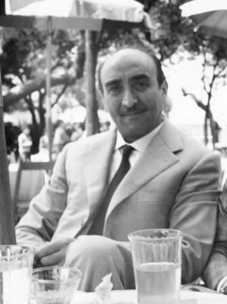 Businessman at a sidewalk cafe in 1952.