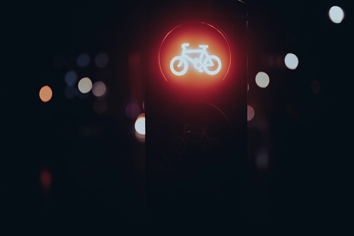 Red traffic lights for bicycles at night, London - England