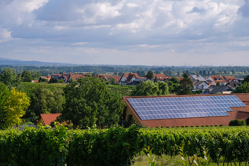 Rural landscape with solar panels in German vineyards. Solar panels for household use.
