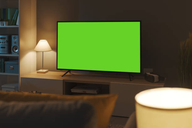 istock Television with horizontal green screen in the living room 1362664663
