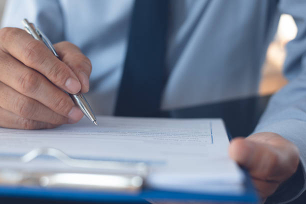istock Businessman working in office, signing business contract 1362665621