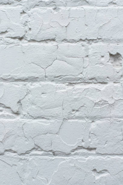 istock Grey brick painted wall textured background close-up. 1362666198