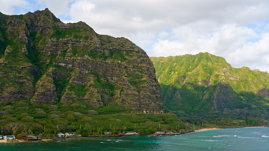 Aerial view of the Kualoa Ridge, Kualoa Beach and Kaawa Valley on Oahu, Hawaii Islands, USA.