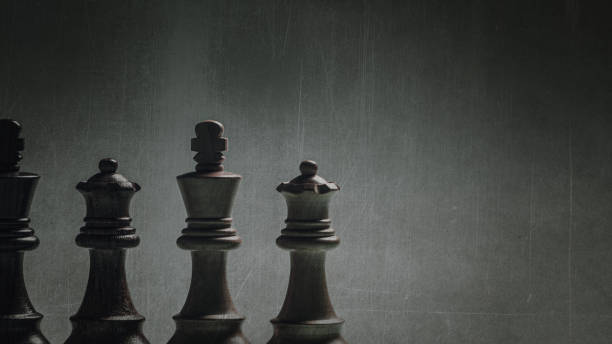 istock Chess kings and queens in line 1362669345