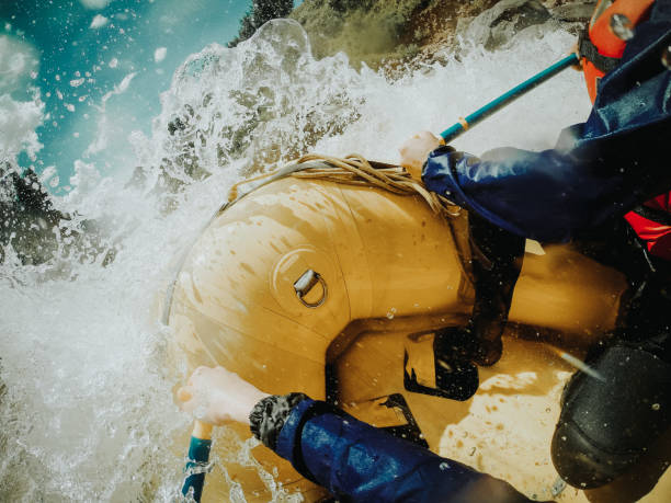 whitewater rafting pov - inflatable raft imagens e fotografias de stock