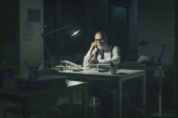 istock Corporate businessman working late at night 1362677209