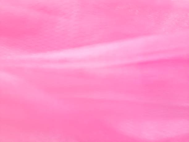 istock Blurred background of a pink fabric 1362678444