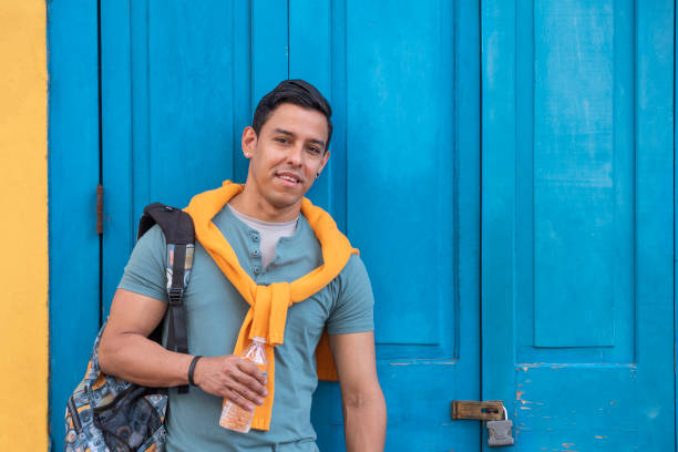 istock Young latin men with a bottle of water 1362679490