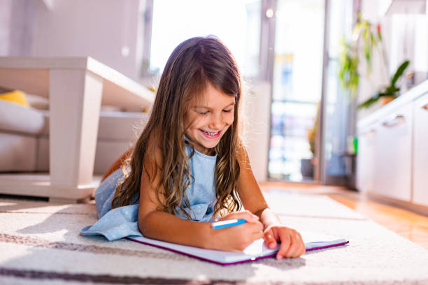 istock Beautiful girl drawing 1362679692