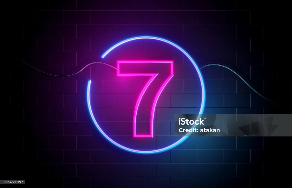 Number 7 Neon Light Sign Number 7 neon sign illuminated with blue and purple lights. Marketing And Consumerism Concept. Number 7 Stock Photo