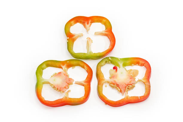 istock Bell pepper sliced into rings on a white background 1362681642