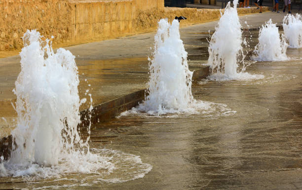 istock Fountains with jets from the ground to refresh people 1362684991