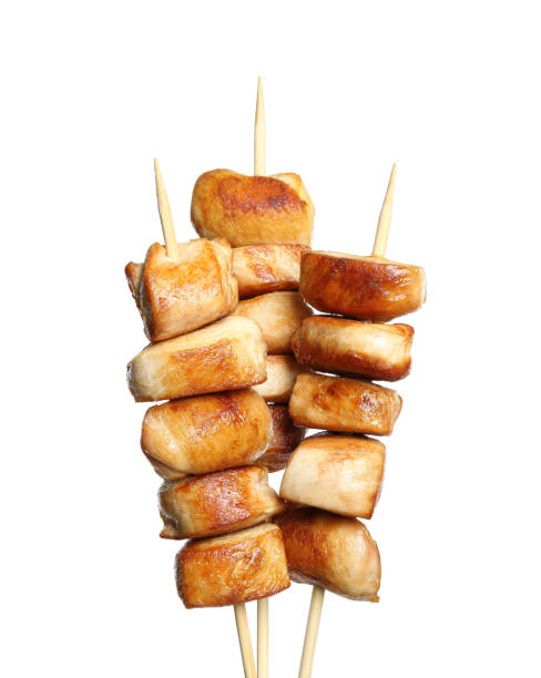 istock Delicious chicken shish kebabs on white background 1362686471