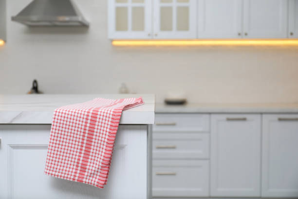 istock Clean kitchen towel on marble table at home. Space for text 1362686720