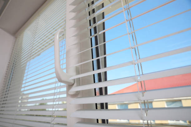 istock Closeup view of plastic window with blinds 1362687591