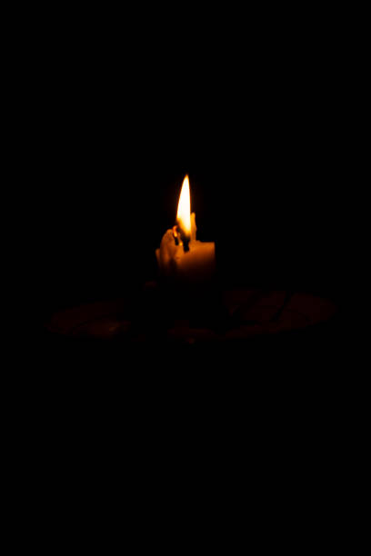 istock A candle that burns in the dark 1362689142