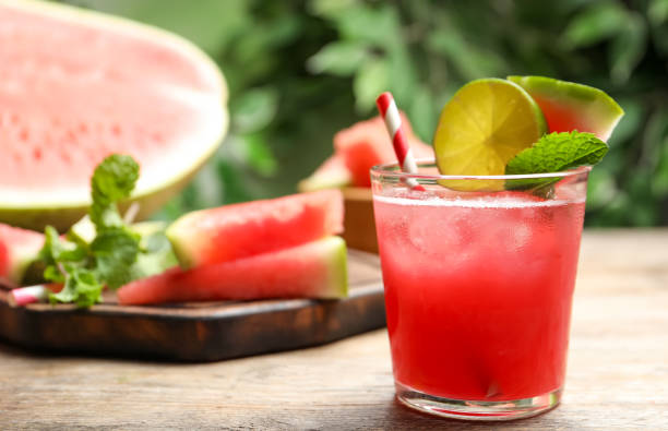 istock Delicious fresh watermelon drink on wooden table 1362689293