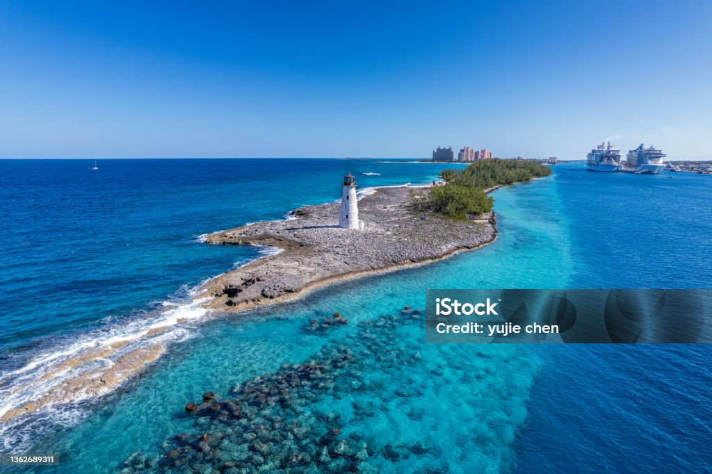 The drone aerial of Nassau Harbour Lighthouse in Paradise Island, Nassau, Bahamas Cruise Ship Stock Photo