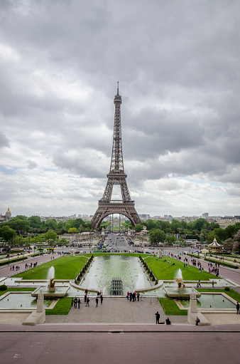 Eiffel Tower in Paris with Trocadero gardens and water fountains in the foreground