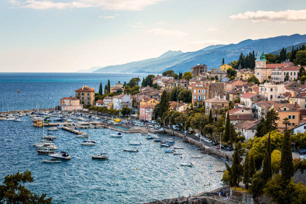 Volosko harbor in Croatia Opatija taken during summer times with view on boats and town