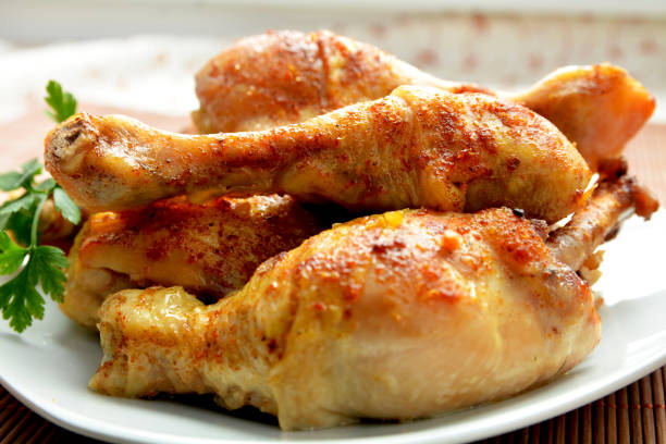 roasted chicken thighs - chicken rotisserie roast chicken barbecue grill imagens e fotografias de stock