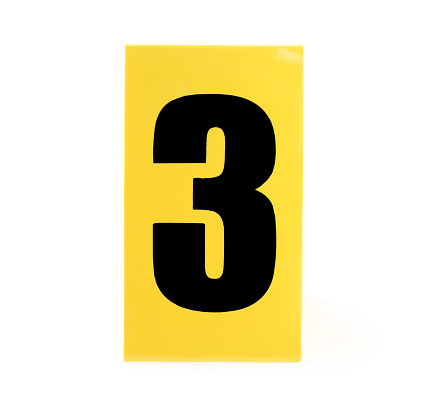 Yellow crime scene marker with number three on white background