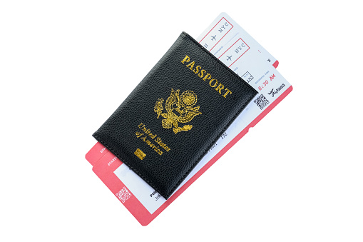Pasaporte y entradas aisladas en blanco, vista superior. Concepto de agencia de viajes photo