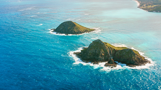 Aerial view of Moku Nui and Moku Iki islands in Kailua, Oahu. Shot in Hawaii, USA.