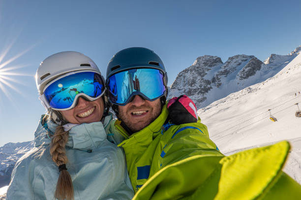 istock Young couple taking a selfie on a ski winter holiday 1362704738
