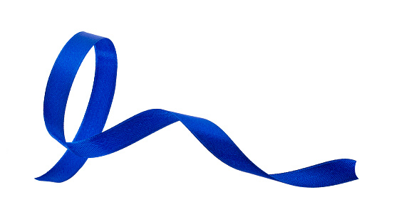 Bright blue curled ribbon close up on white, concept or symbol of health day, copy space