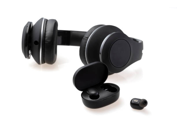 istock Wireless earphones and headphone on white background 1362710475