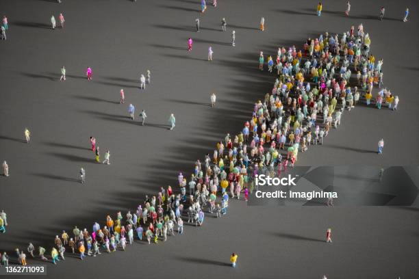 Large Group Of People Forming A Growing Arrow Stock Photo - Download Image Now - Growth, Organization, Aspirations