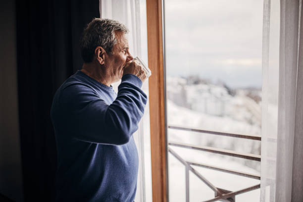 istock The man is drinking coffee looking out the window 1362715524