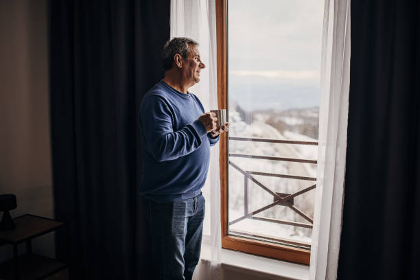 istock The man is drinking coffee looking out the window 1362715582