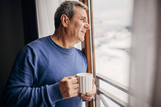 istock The man is drinking coffee looking out the window 1362715601