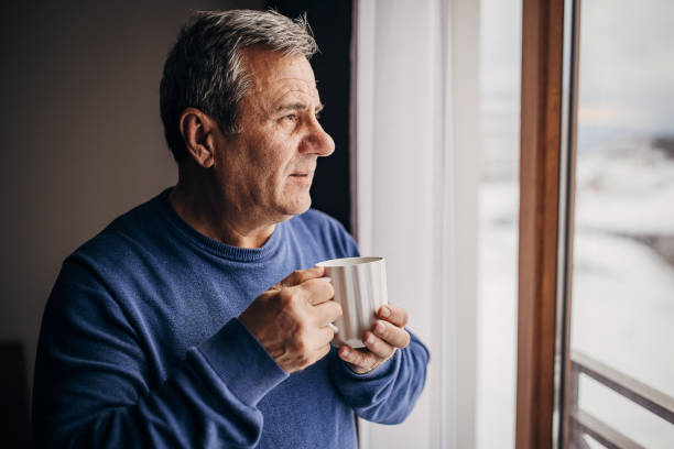 istock The man is drinking coffee looking out the window 1362715603