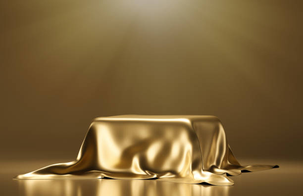 istock An empty pedestal covered with a golden cloth. 3D rendering illustration. 1362715626