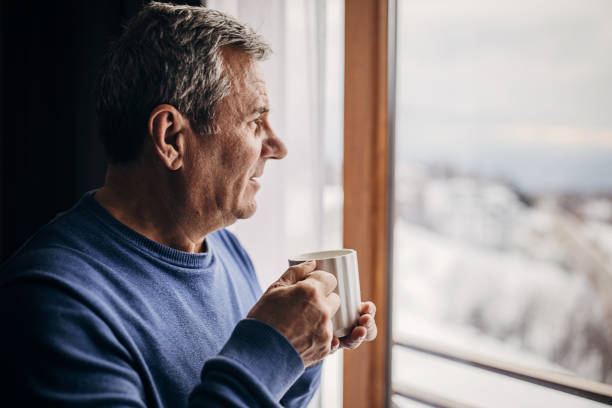 istock The man is drinking coffee looking out the window 1362715640