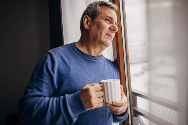 istock The man is drinking coffee looking out the window 1362715645