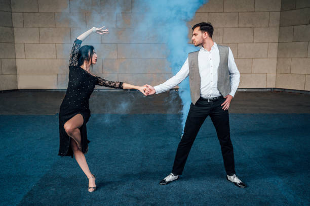 istock Man and woman dancing on stage 1362718457