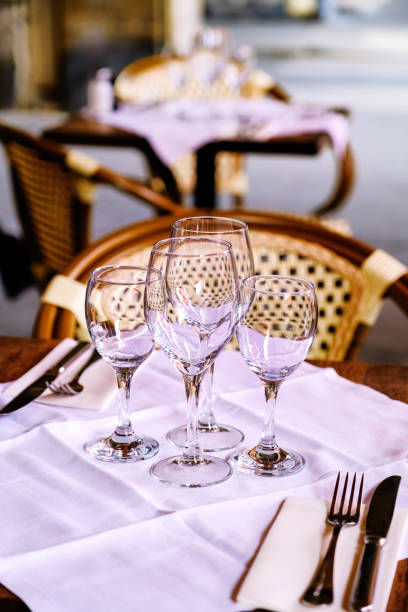 glass on a table - french restaurant stock photo