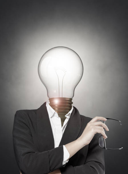 istock Businesswoman with light bulb head 1362720500