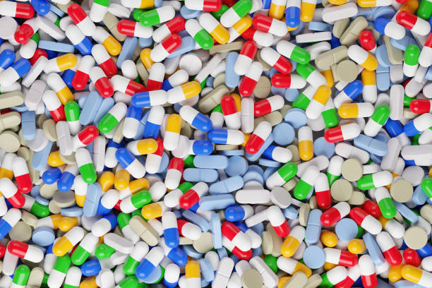 istock Colorful pills background. Top view. 3d illustration. 1362721912