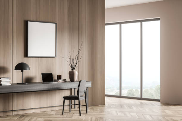 istock Corner of wooden home office with square mockup and panoramic view 1362723037